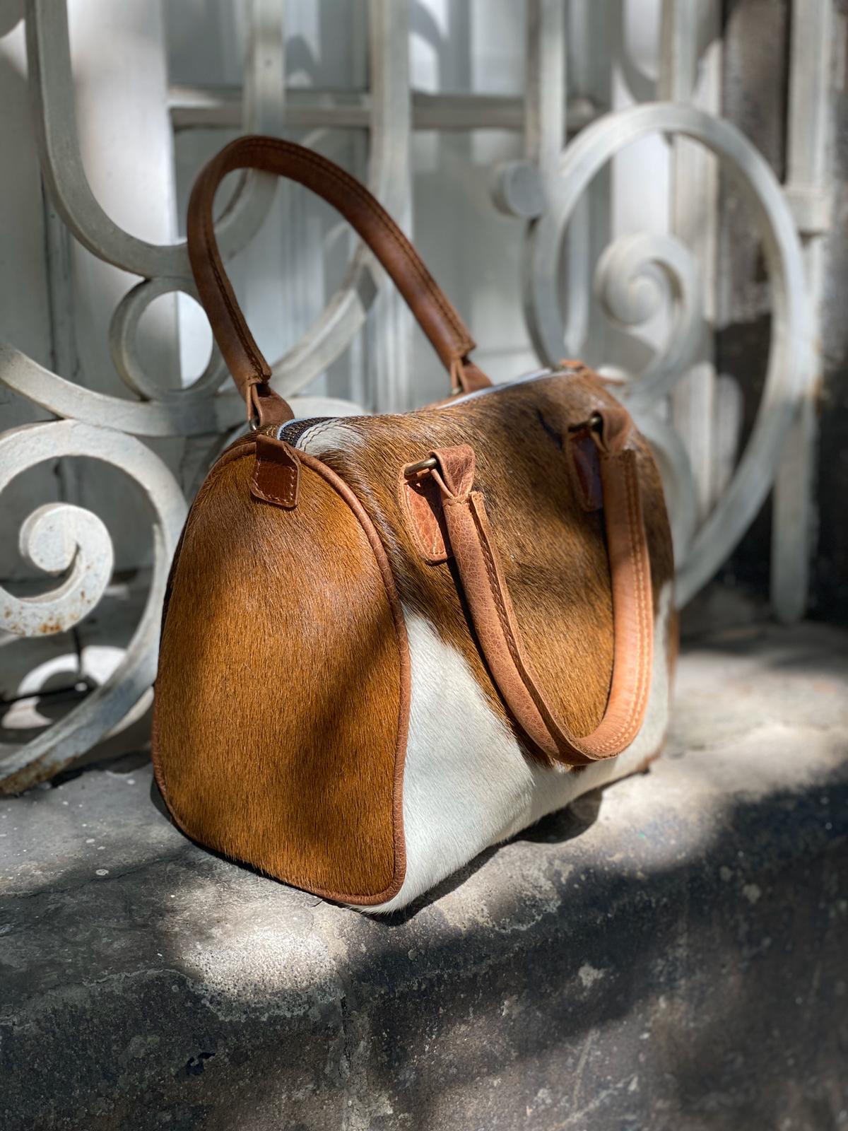 Cowhide bag discount